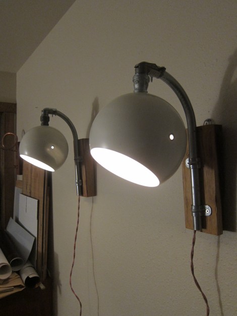 Scrap wood, conduit, reused fixtures.